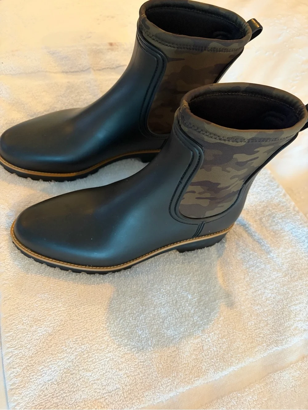 Bernardo Black Ankle Rain Boots with camo accents.